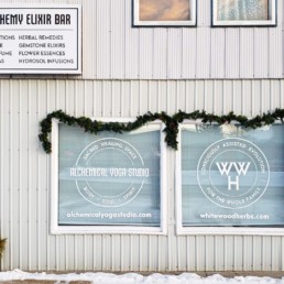 Exterior Building Sign and Window Decals for White Wood Herbs in Lanigan, SK